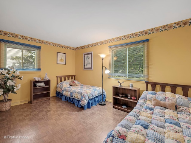 bedroom featuring parquet floors