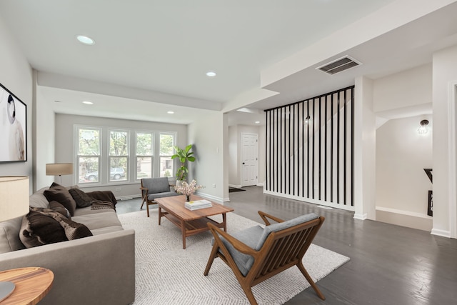 living room with dark hardwood / wood-style flooring