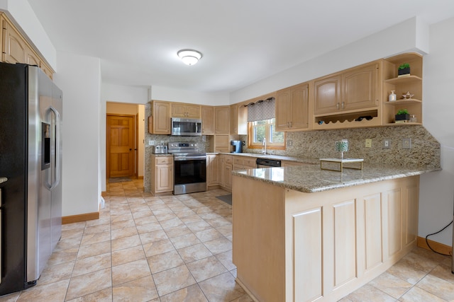 kitchen with backsplash, kitchen peninsula, appliances with stainless steel finishes, and light tile patterned floors