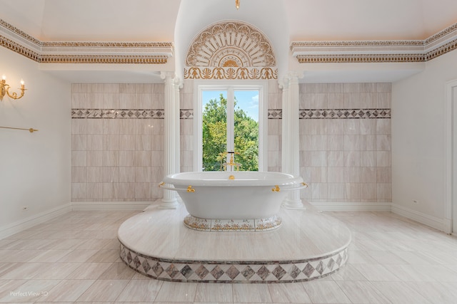 bathroom featuring tile patterned flooring and a washtub