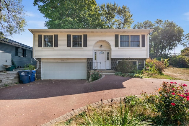 raised ranch with a garage