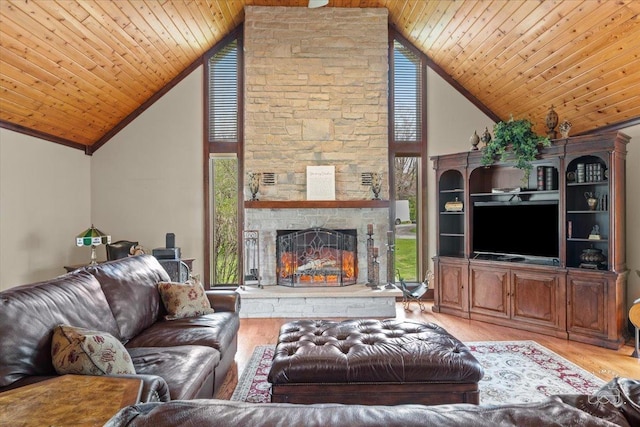 living room with high vaulted ceiling, wood ceiling, and light wood-type flooring