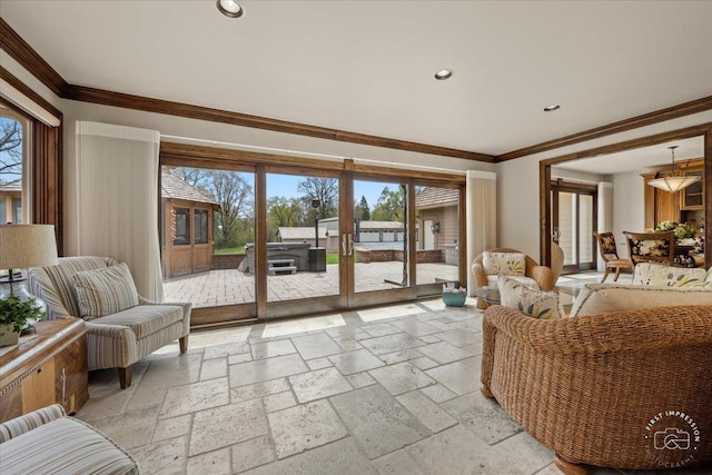 living area featuring ornamental molding, recessed lighting, stone tile flooring, and french doors