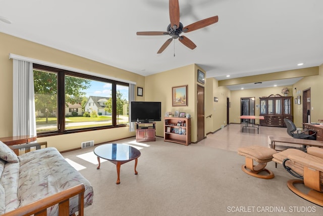 living room featuring ceiling fan