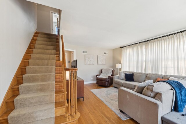 living room featuring light wood-type flooring