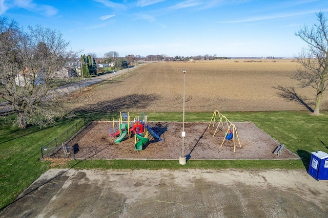 view of playground featuring a lawn