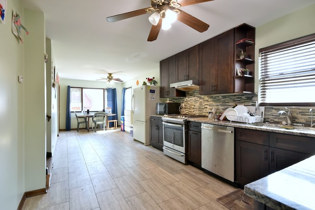 kitchen with range, decorative backsplash, dishwasher, white fridge, and ceiling fan