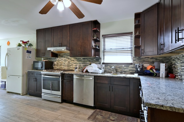 kitchen featuring backsplash, dishwasher, stove, ceiling fan, and dark brown cabinetry