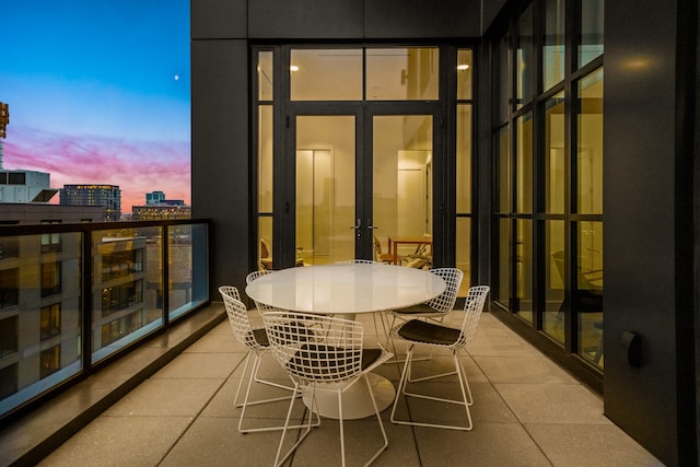 view of balcony at dusk