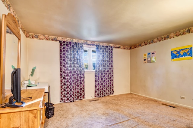 view of carpeted spare room