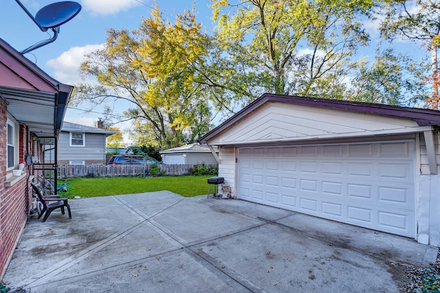 garage with a lawn