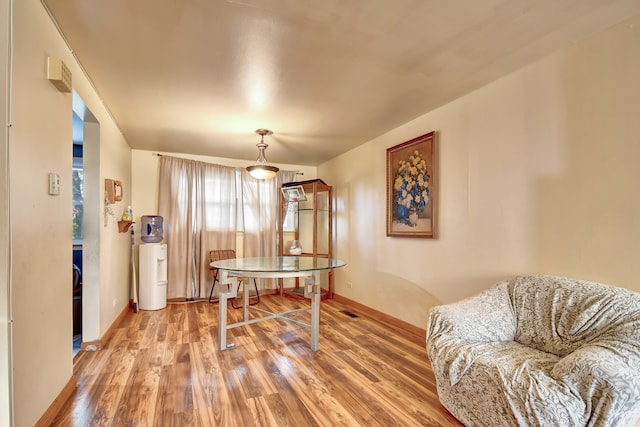 office with hardwood / wood-style flooring