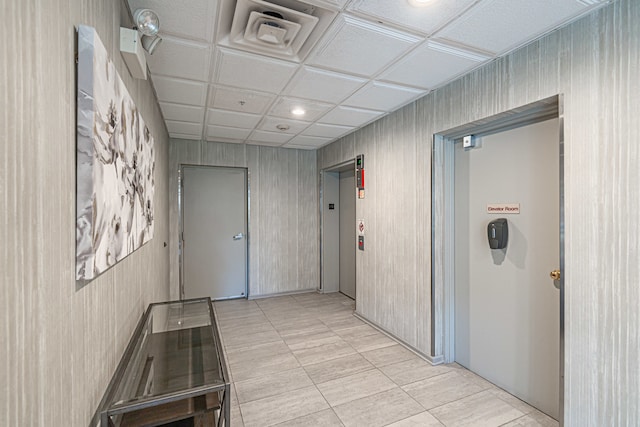 mudroom featuring light tile patterned flooring