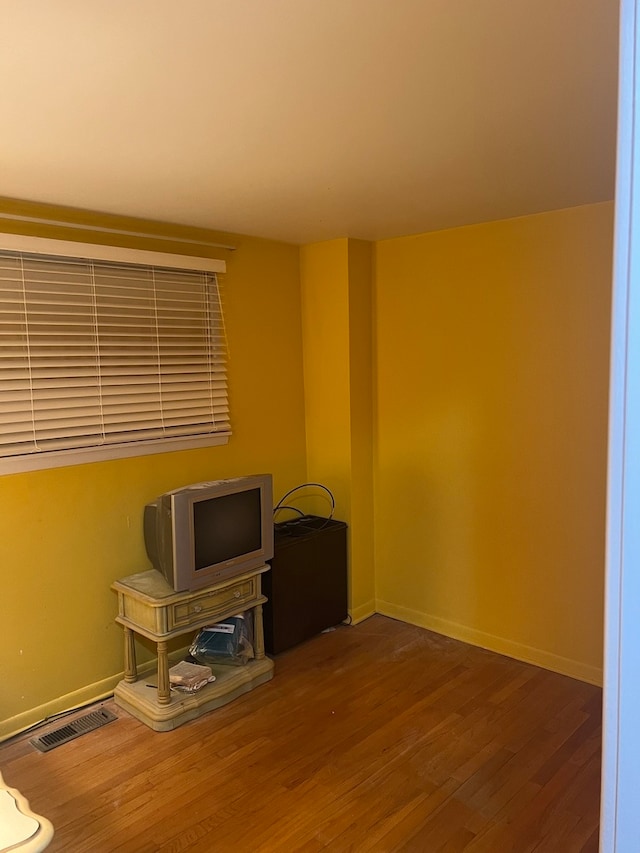 interior space with hardwood / wood-style flooring