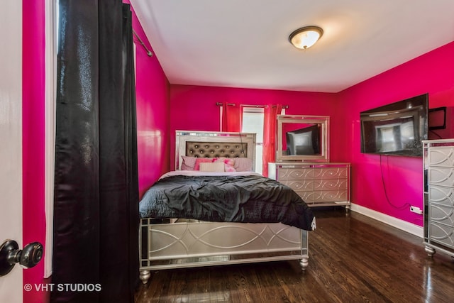 bedroom featuring wood-type flooring