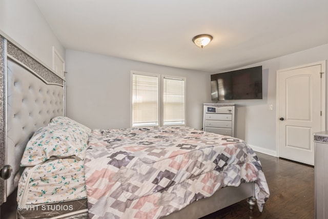 bedroom featuring dark hardwood / wood-style floors