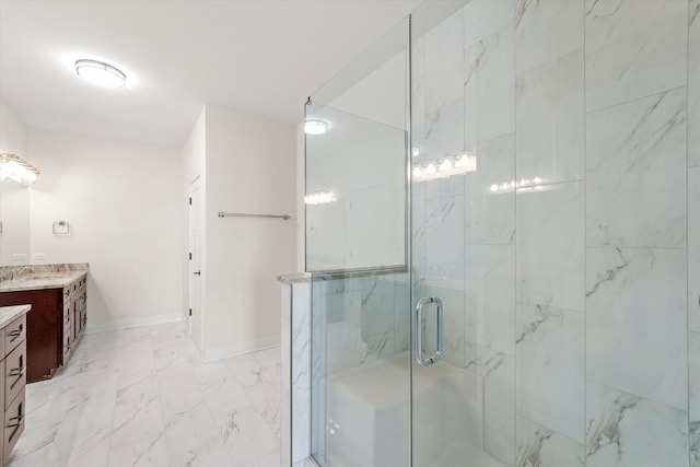 bathroom with an enclosed shower and vanity