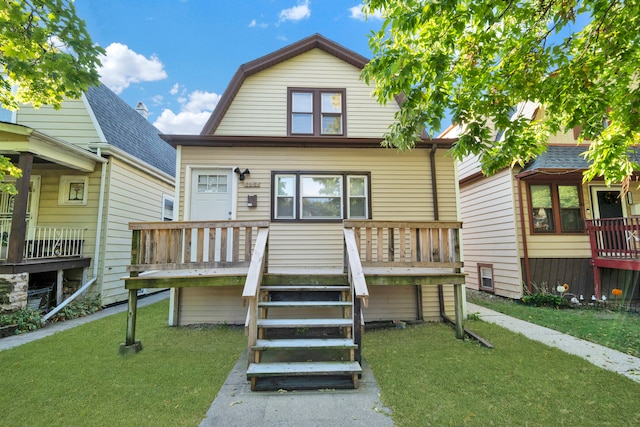 exterior space with a wooden deck and a lawn