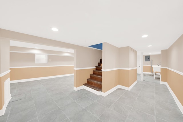 basement with light tile patterned floors