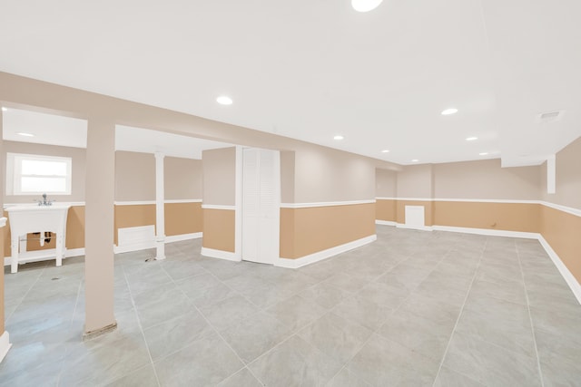 empty room with light tile patterned flooring