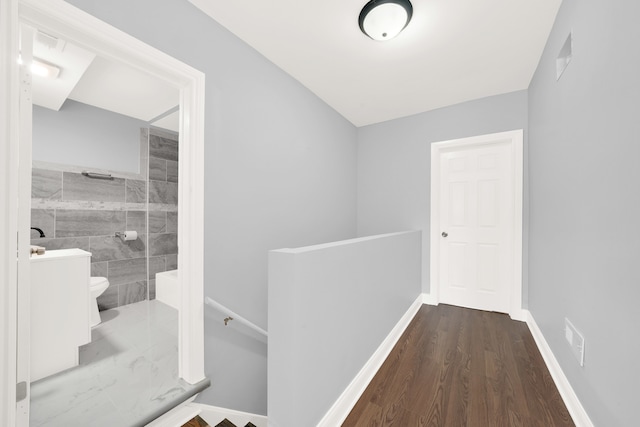 hall featuring dark hardwood / wood-style floors