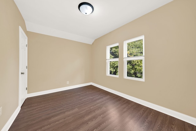 spare room featuring dark hardwood / wood-style floors