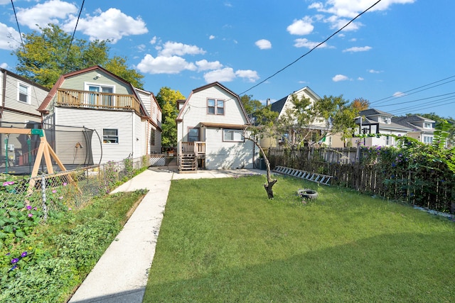 view of yard featuring a fire pit and a patio area