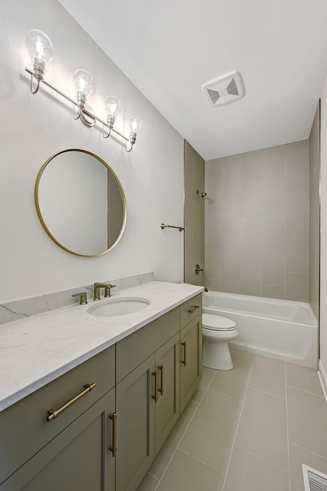 full bath with visible vents, toilet,  shower combination, vanity, and tile patterned flooring