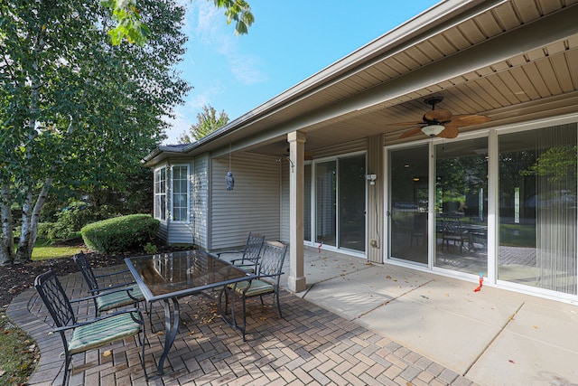 view of patio featuring ceiling fan