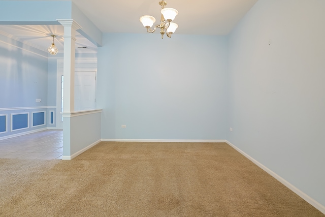 unfurnished room featuring light carpet and an inviting chandelier