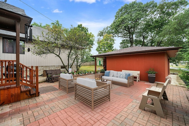 view of patio featuring outdoor lounge area and a wooden deck