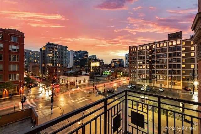 view of balcony at dusk