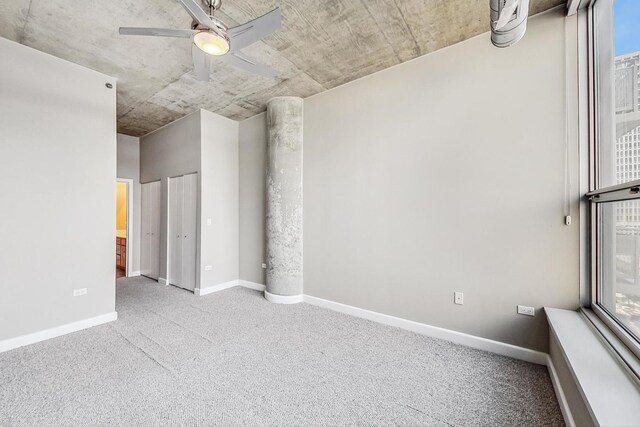 unfurnished room with light carpet and ceiling fan