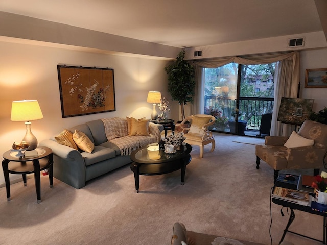 carpeted living room with visible vents