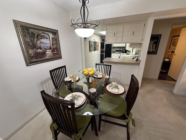 840 Elder Rd Unit A414, Homewood, IL 60430 - dining space with light colored carpet and baseboards