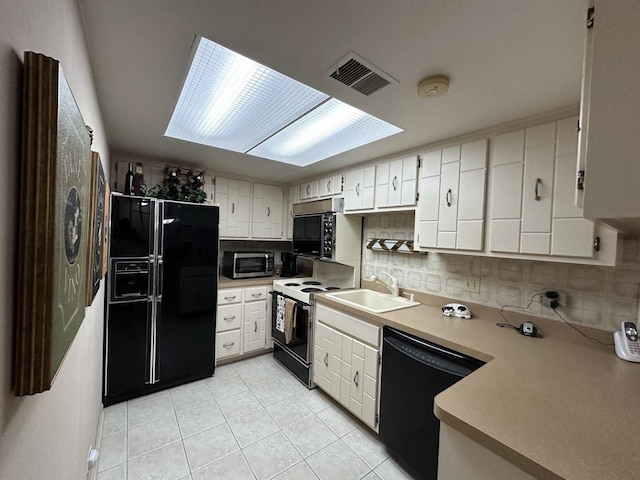 840 Elder Rd Unit A414, Homewood, IL 60430 - kitchen featuring a sink, tasteful backsplash, black appliances, visible vents, and light tile patterned floors