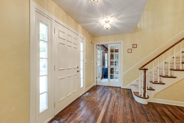 entryway featuring dark wood-type flooring