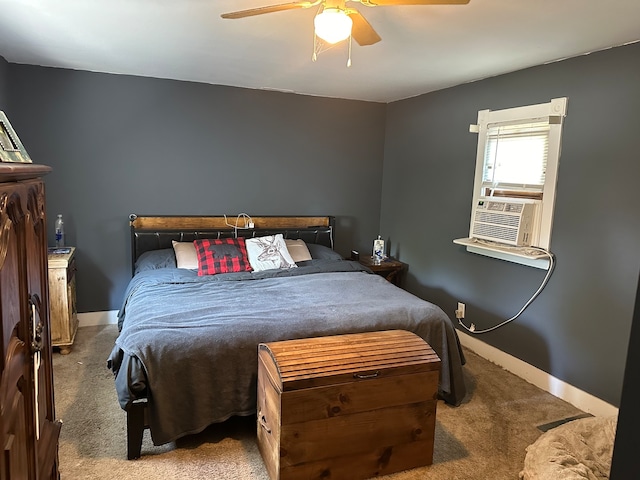 carpeted bedroom featuring cooling unit and ceiling fan