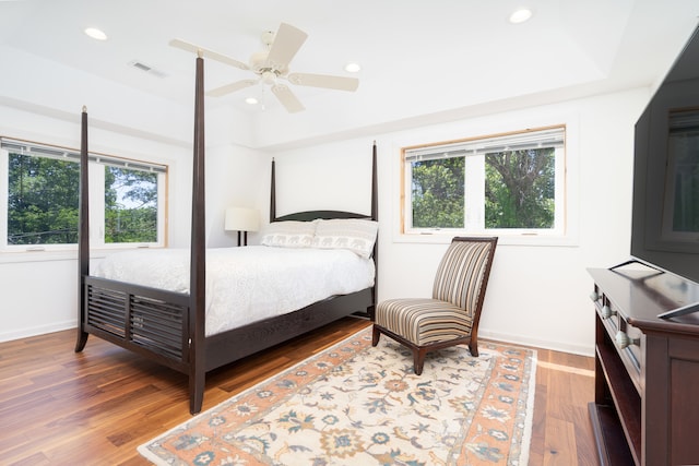 bedroom featuring ceiling fan and hardwood / wood-style floors