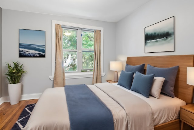 bedroom featuring hardwood / wood-style floors