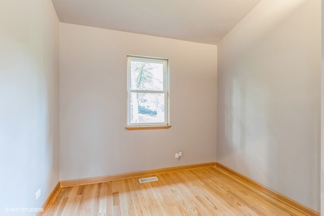 unfurnished room featuring light hardwood / wood-style floors