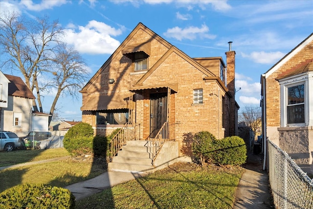 view of front of home with a front yard