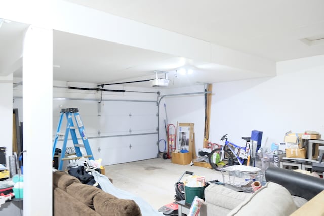 garage featuring a garage door opener