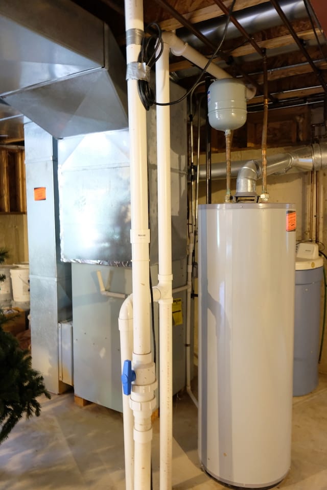 utility room with water heater