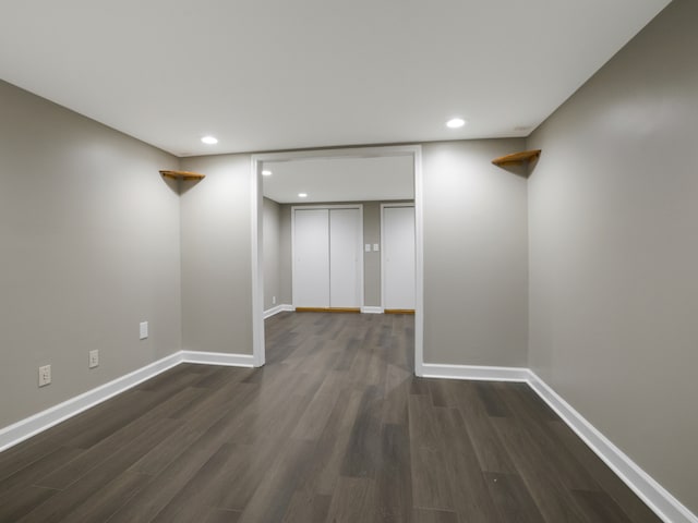 basement with dark wood-type flooring