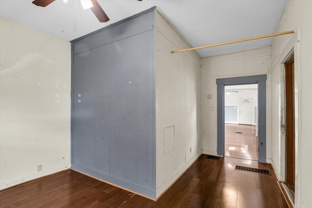 entryway featuring ceiling fan and dark hardwood / wood-style flooring