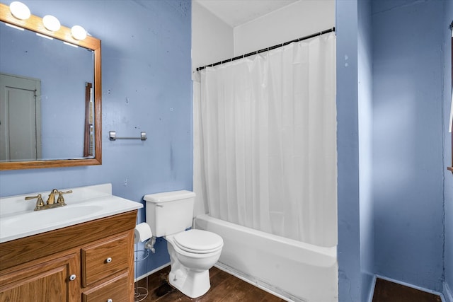 full bathroom featuring vanity, shower / tub combo with curtain, toilet, and hardwood / wood-style flooring