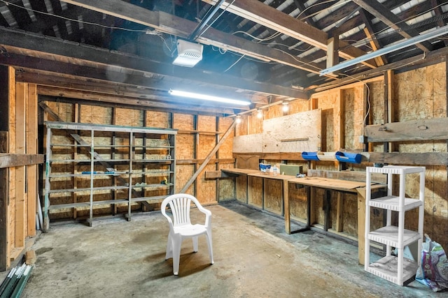 basement with a workshop area