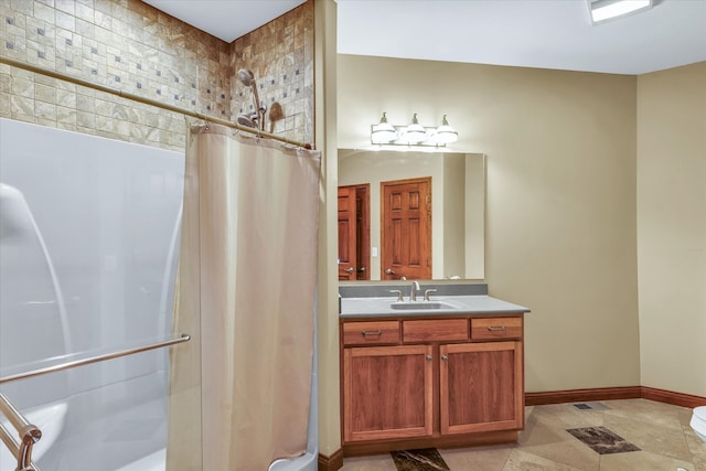 bathroom with tile patterned floors, vanity, and a shower with shower curtain