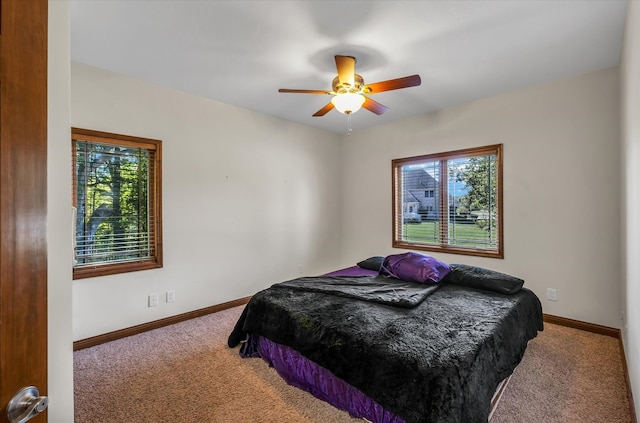 bedroom with carpet flooring and ceiling fan